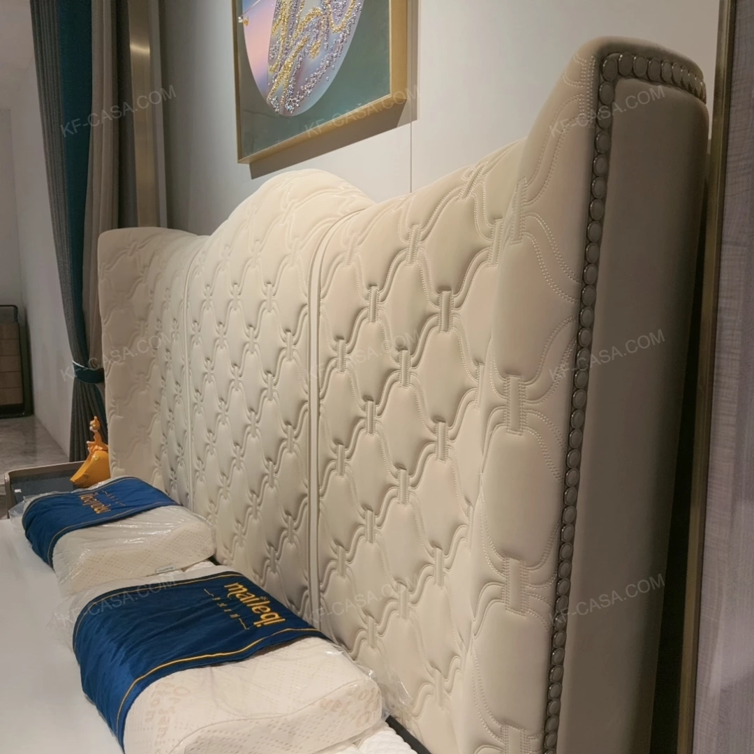 Cream Quilted Upholstered Bed with Patterned Stitching & Gold Stainless Steel Accents